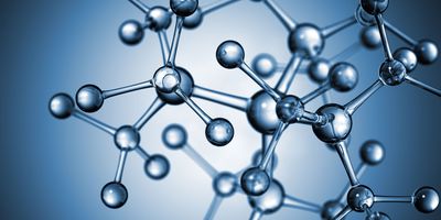 3D rendering of a translucent molecule structure composed of various spheres and cylinders connected by lines representing chemical bonds