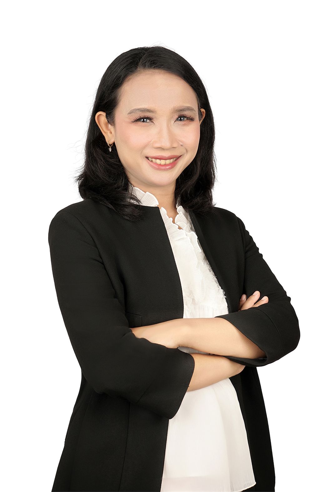 A portrait of Antonia Saktiawati, a female clinician, in a white blouse and black blazer. A portrait of Antonia Saktiawati, a female clinician, in a white blouse and black blazer.