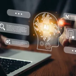 Person using a laptop with a glowing AI brain graphic and floating digital interface icons representing search, settings, tools, and data analysis.