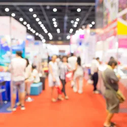 Abstract blurred trade fair exhibition with people