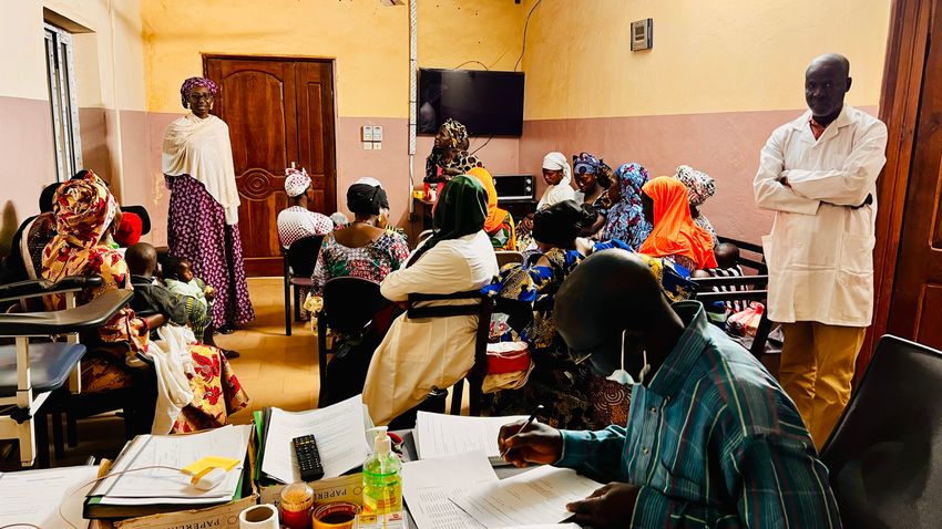 Multiple people are in Kassoum Kayentao’s clinic in Mali.