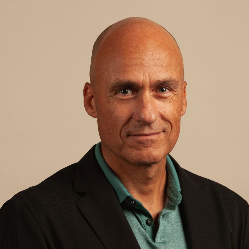 A headshot of George Dimopoulos.