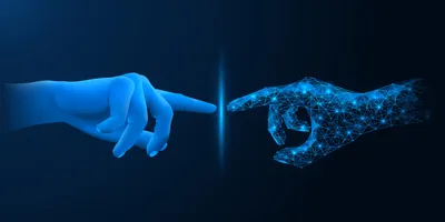 A hand reaching out to touch an artificial projection of another hand, mirrored