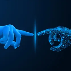 A hand reaching out to touch an artificial projection of another hand, mirrored