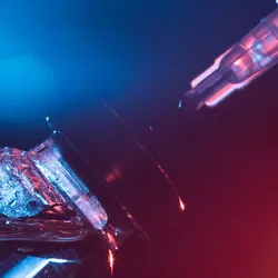 Close-up of a vaccine vial and syringe under blue and red lighting
