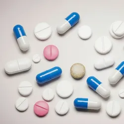 A scattering of different pills. 