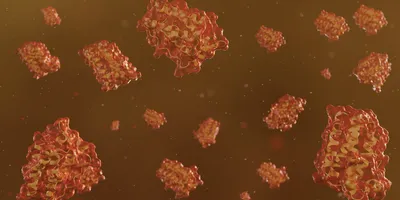 A 3D rendering of red and yellow protein molecules floating in a fluid-like environment.