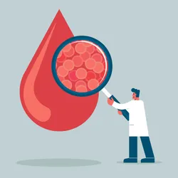 Researcher using magnifying glass on blood drop to study drug levels