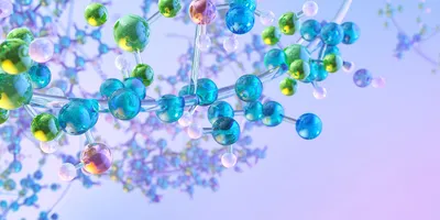A colorful 3D rendering of molecular structures featuring interconnected blue, green, and yellow spheres representing atoms and bonds, symbolizing chemical and biological complexity.