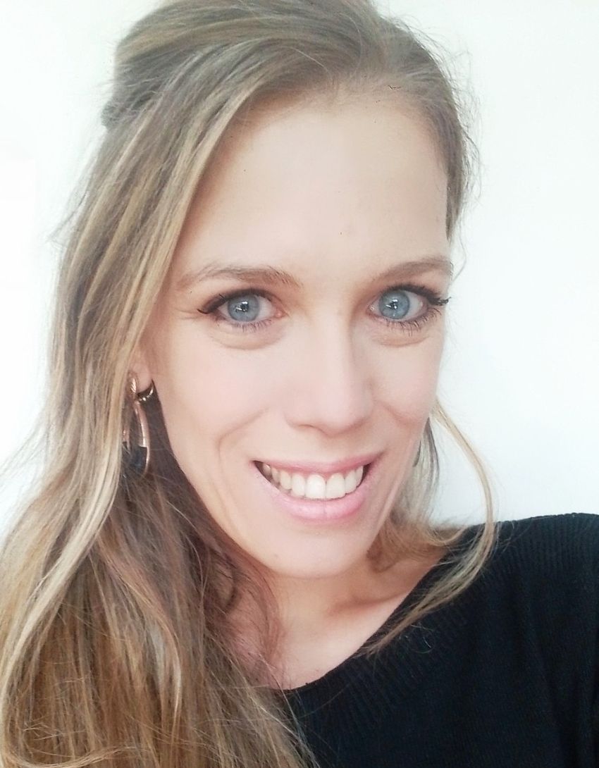 Smiling woman with long hair and earrings Smiling woman with long hair and earrings