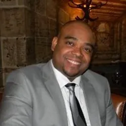 Headshot of Denis Beckford