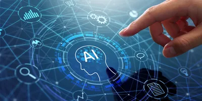 Hand reaching toward a glowing AI head icon on a digital network interface with connected tech symbols.