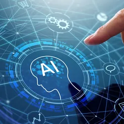 Hand reaching toward a glowing AI head icon on a digital network interface with connected tech symbols.