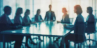 Business people in a boardroom strategy meeting