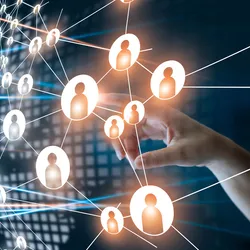 A network of interconnected human icons overlaid on a world map, representing global collaboration and population-scale data connections.