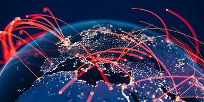 Illustration of a glowing digital globe with interconnected lines and nodes representing a global communication network and worldwide data connectivity.