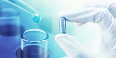 Photo of laboratory research on medicine with scientific equipment and chemical glassware representing scientific discovery and medical research