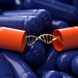 Gold DNA strand in an open, orange pill capsule, on top of closed blue pill capsules.