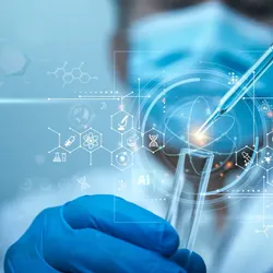 Scientist in front of illustration