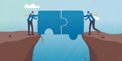 Two people holding puzzle pieces on opposite ends 
