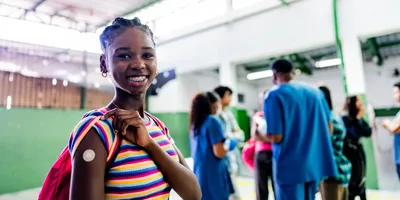 Portrait of a teenager student after taking vaccine at school