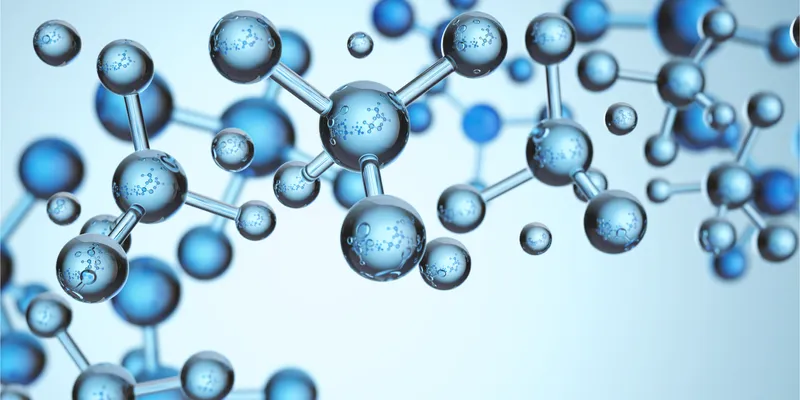 Illustration of interconnected blue molecular structures with spherical atoms and chemical bonds on a light blue background. 