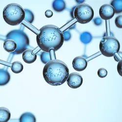 Illustration of interconnected blue molecular structures with spherical atoms and chemical bonds on a light blue background. 