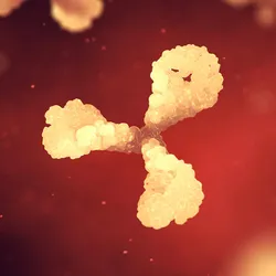 3D rendering of a Y-shaped antibody molecule surrounded by blurred molecular structures against a red background.