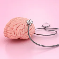 Brain being monitored with a stethoscope on a pink background.