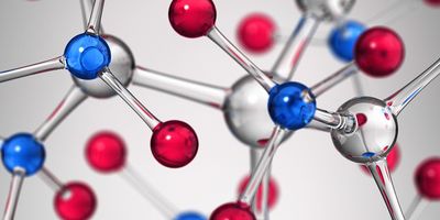 A 3D molecular model showing interconnected red, blue, and silver atoms against a gray background. 