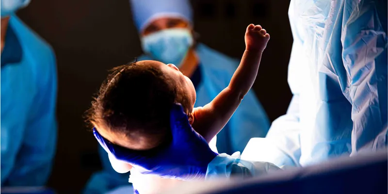 A newborn baby in the operating room