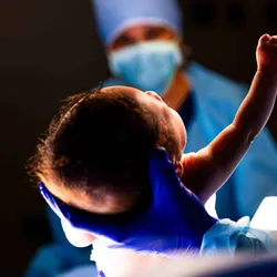 A newborn baby in the operating room