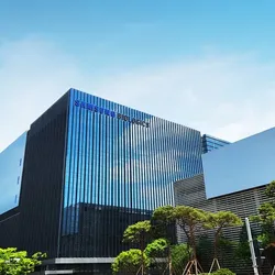 Exterior view of the Samsung Biologics campus building in Songdo, South Korea, headquarters of the CDMO's global biomanufacturing network.