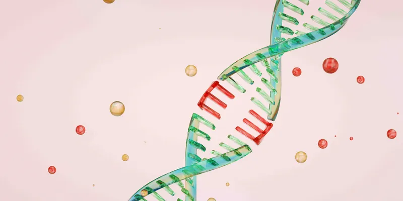A DNA helix in green and red on a pink background.