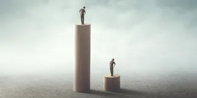 Two figures standing in different leveled platforms.